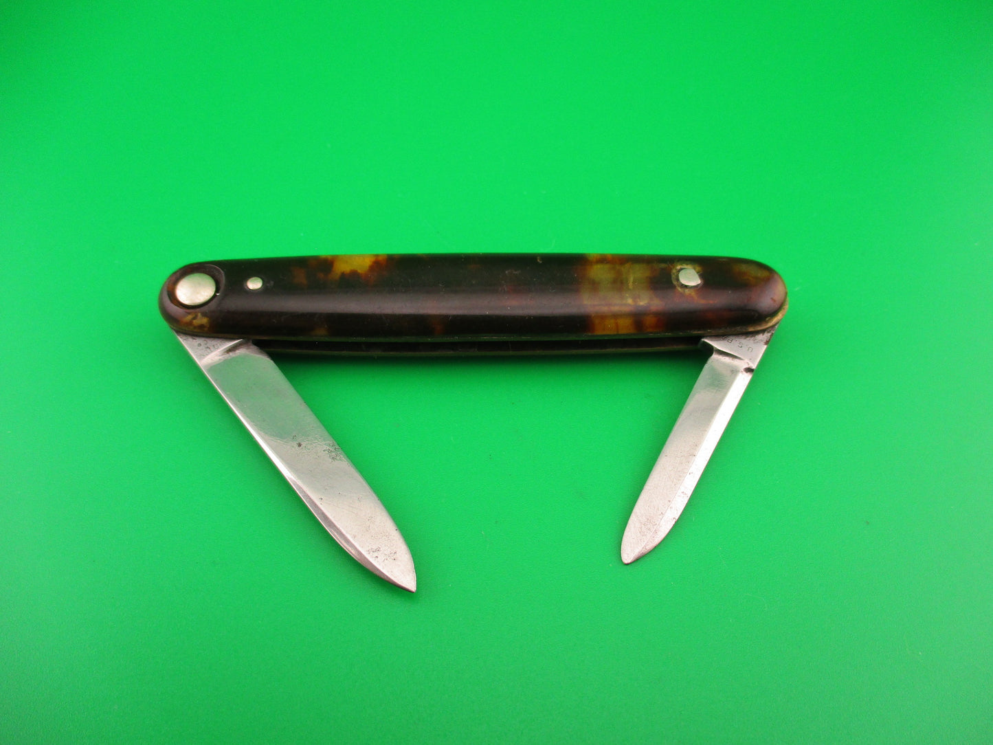 Press Button Knife Co #102 medium double Tortoise celluloid automatic knife
