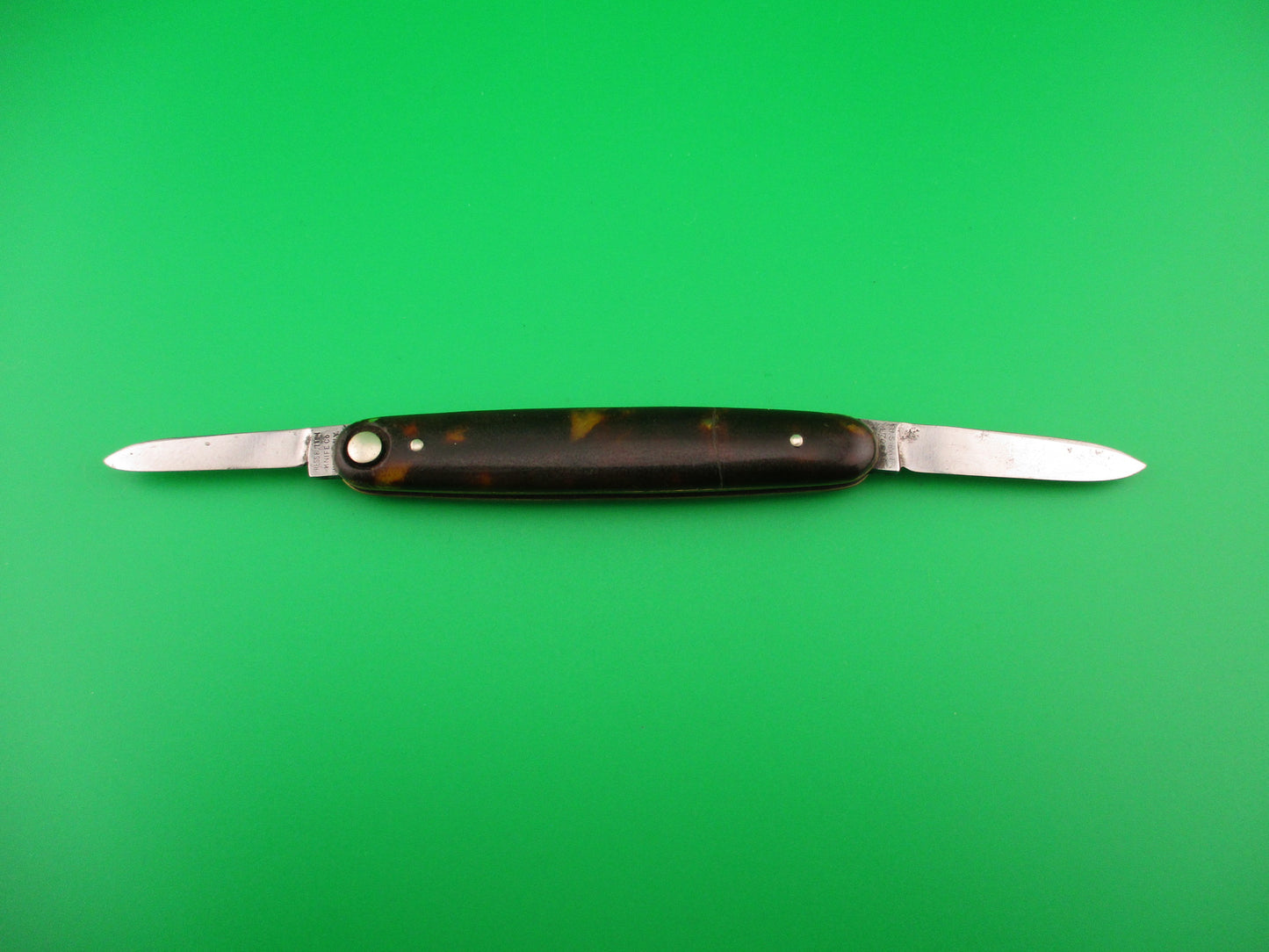 Press Button Knife Co #102 medium double Tortoise celluloid automatic knife
