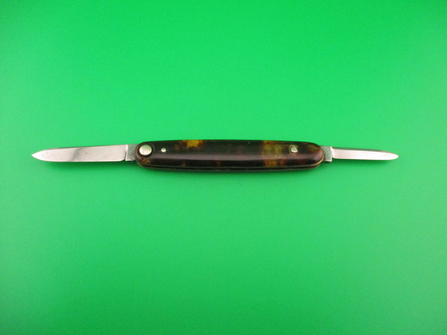 Press Button Knife Co #102 medium double Tortoise celluloid automatic knife