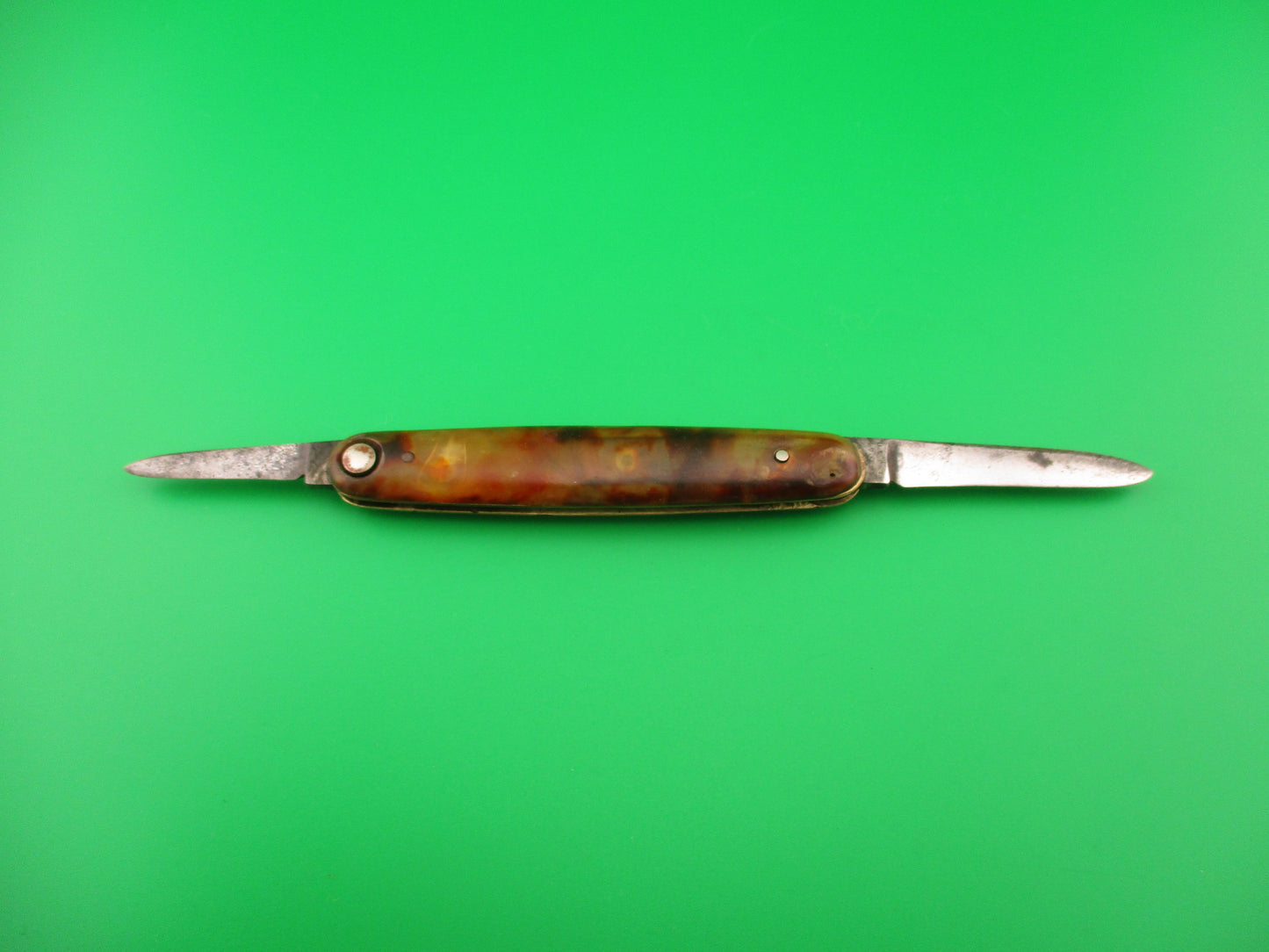 Press Button Knife Co #102 medium double Tortoise celluloid automatic knife