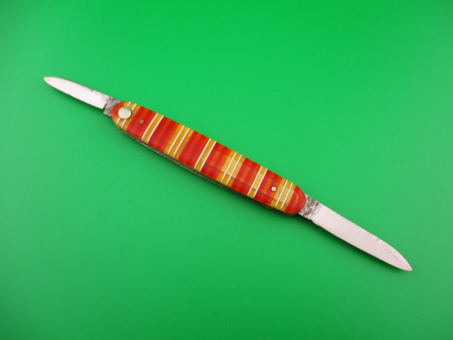 Press Button Knife Co medium double Candystripe antique automatic knife