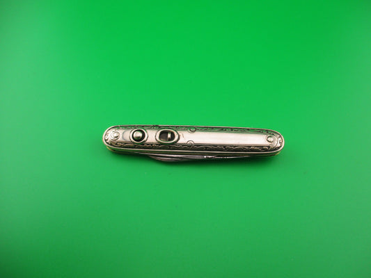 SCHRADE CUT CO Medium 7409GSil double German Silver Deluxe Scroll switchblade knife