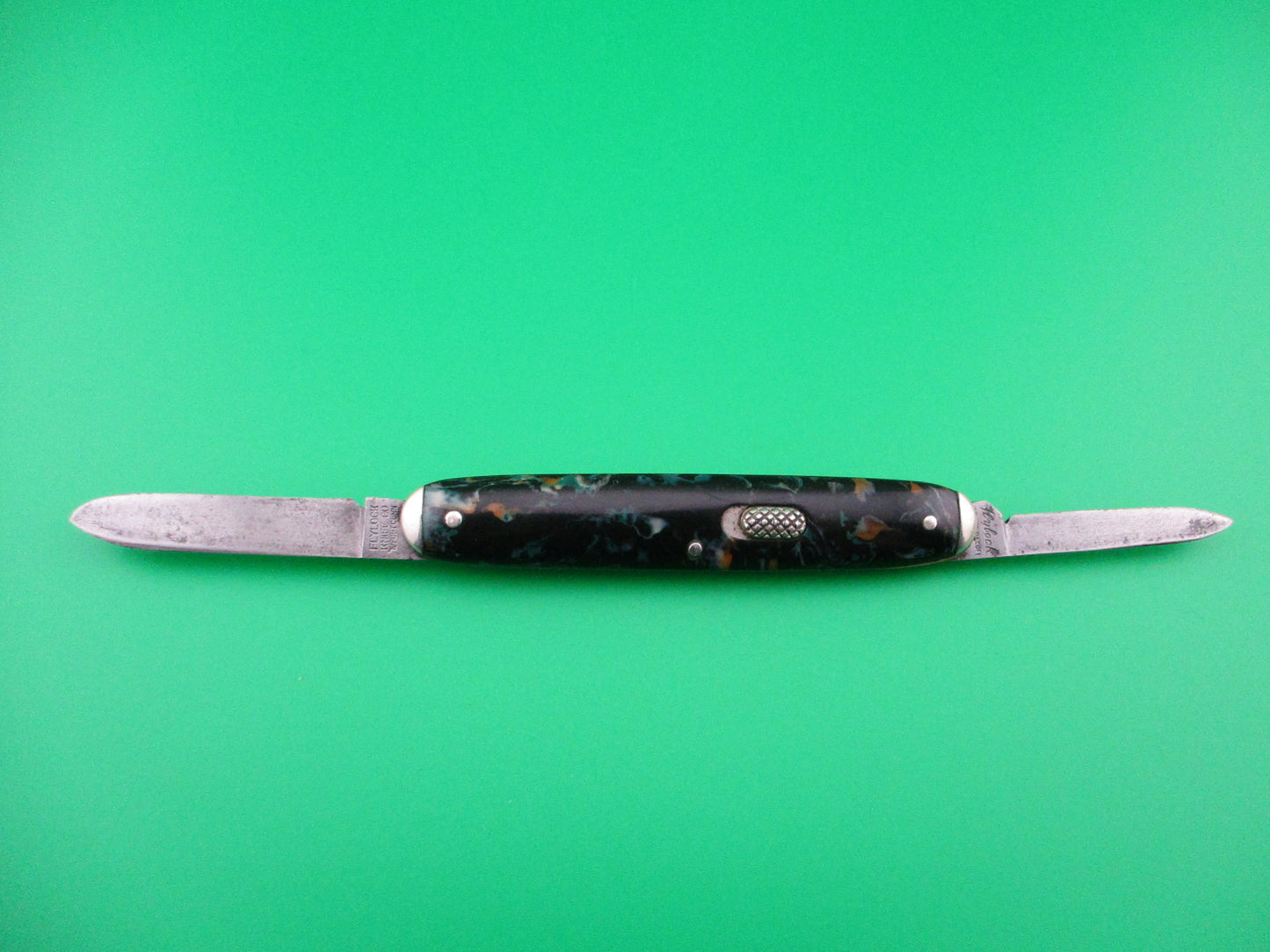 Flylock Double mottled celluloid scales with tip bolsters switchblade knife