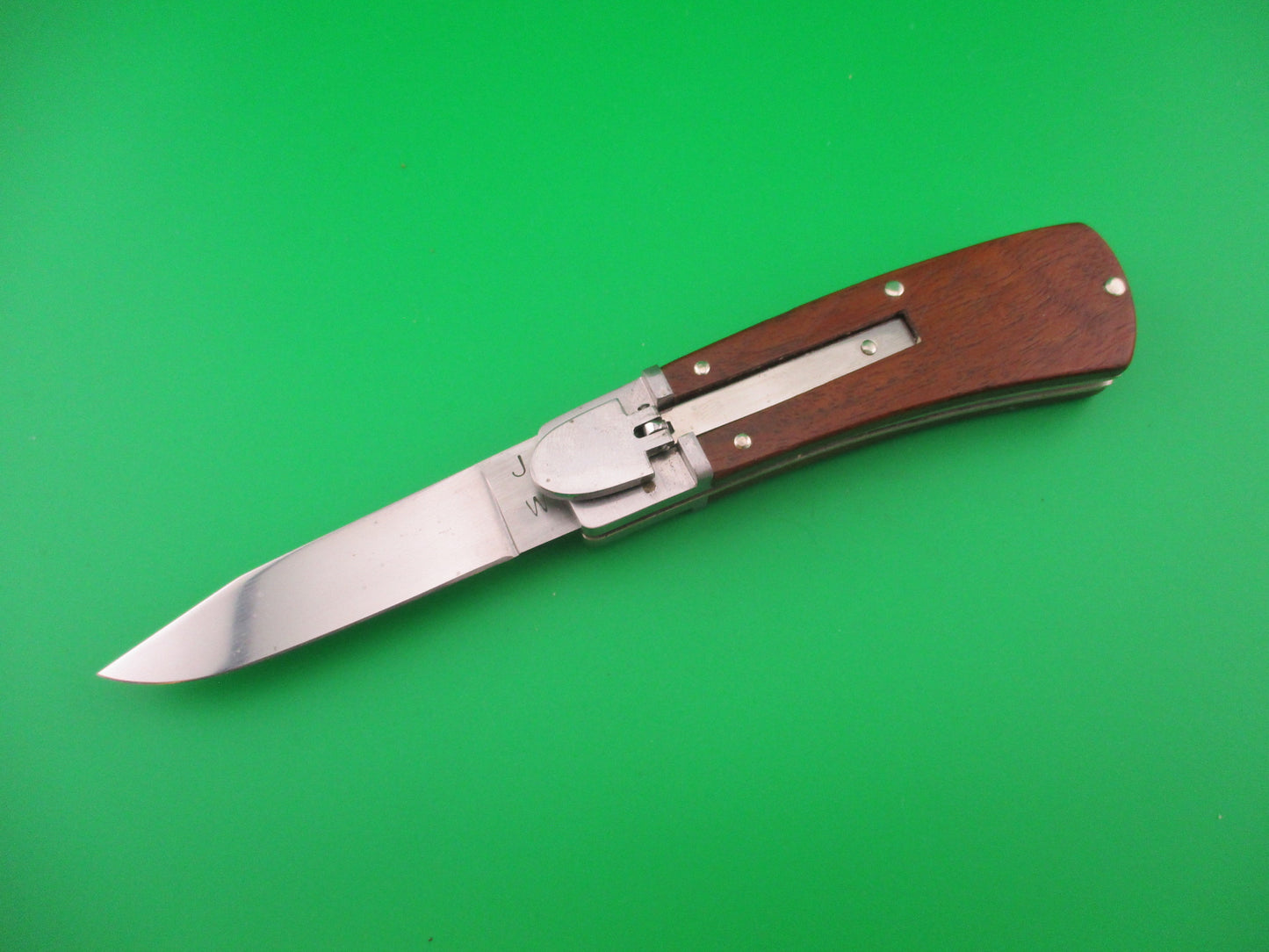 J W Custom 7 inch Lever Release Wood scaled hand made automatic knife