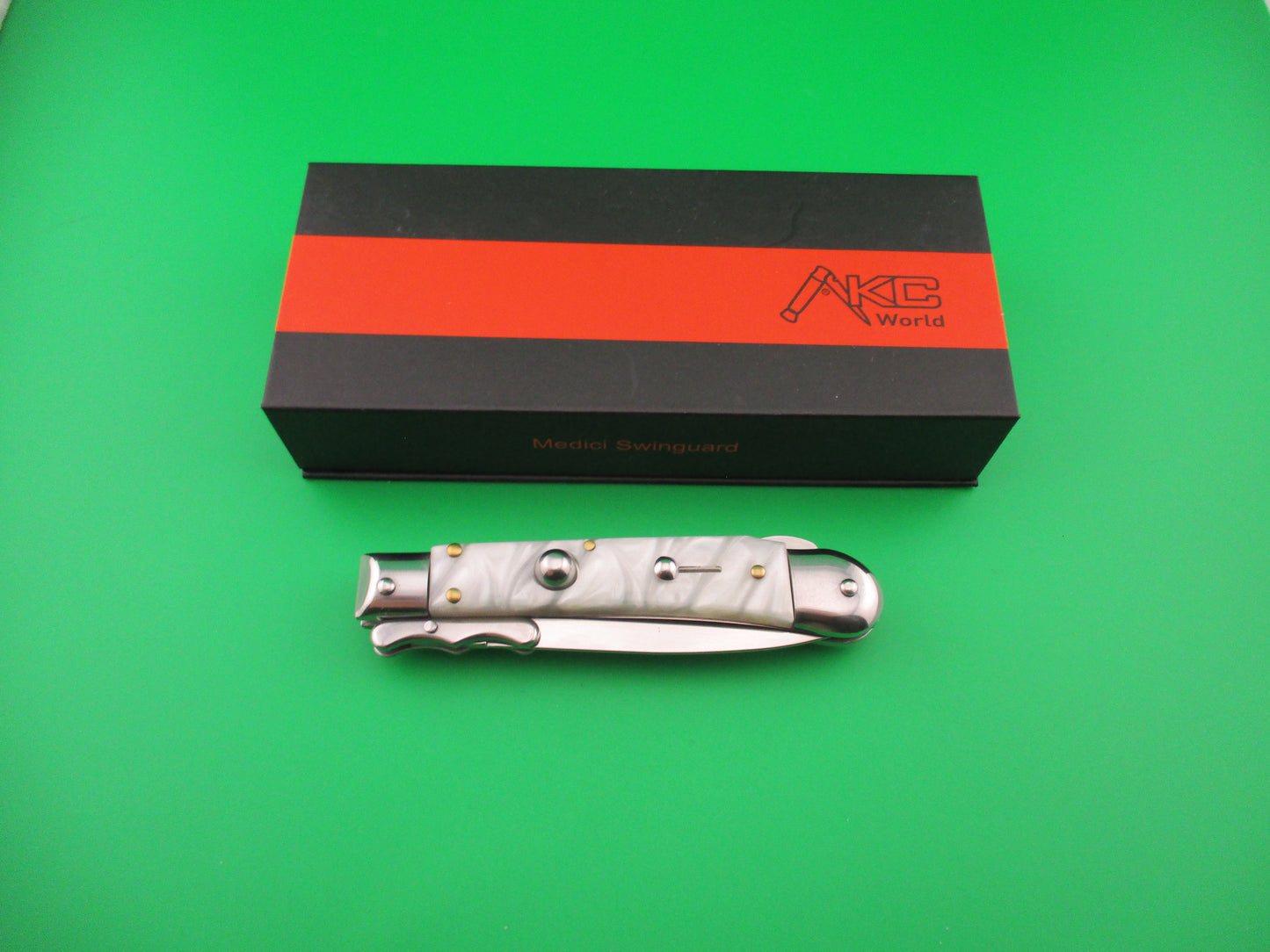 AKC World 19cm Italian Style Medici Pearlex Swing guard automatic knife new in box