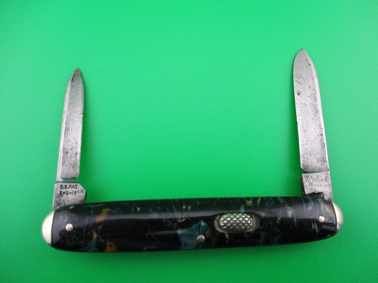 Flylock Double mottled celluloid scales with tip bolsters switchblade knife