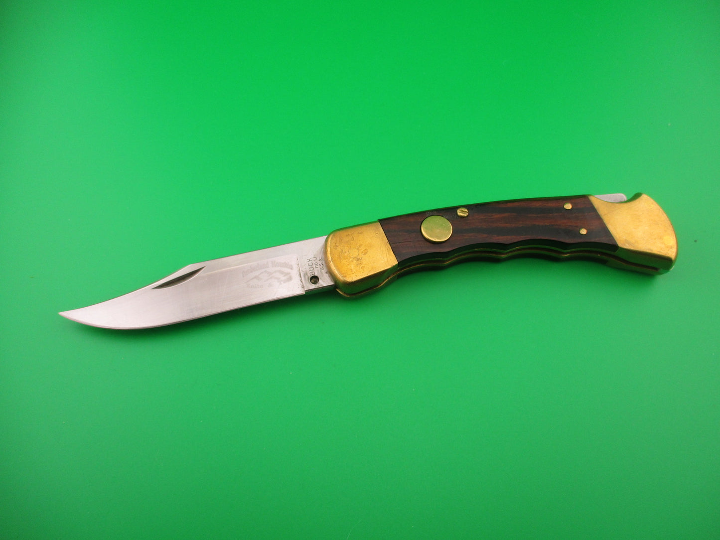 BUCK 110 USA Cumberland Mountain converted SA Round button Wood & Brass automatic knife