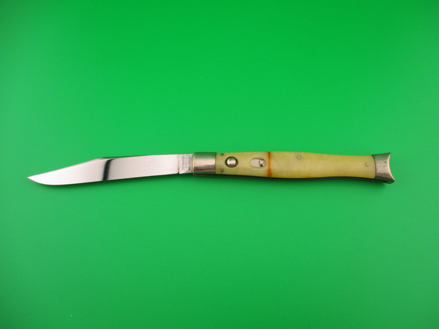 Schrade Cut Co Fishtail #1514AC Dreamsicle celluloid vintage switchblade knife