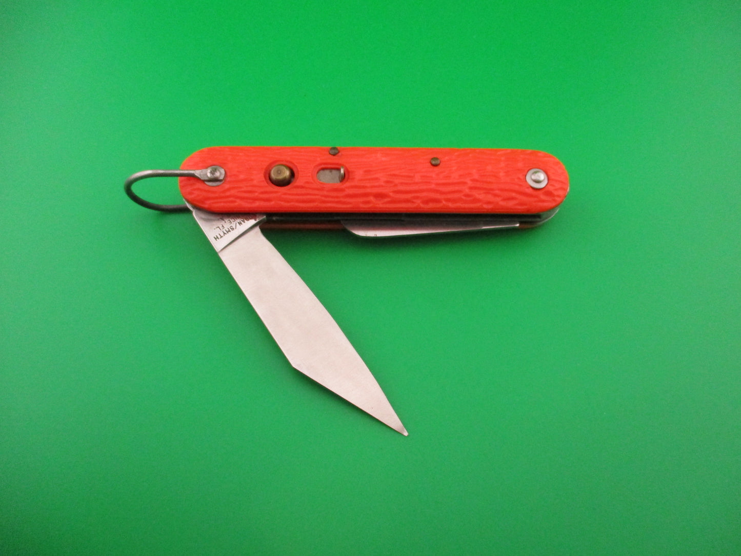 Logan Smyth Venice FL Orange Paratrooper automatic knife