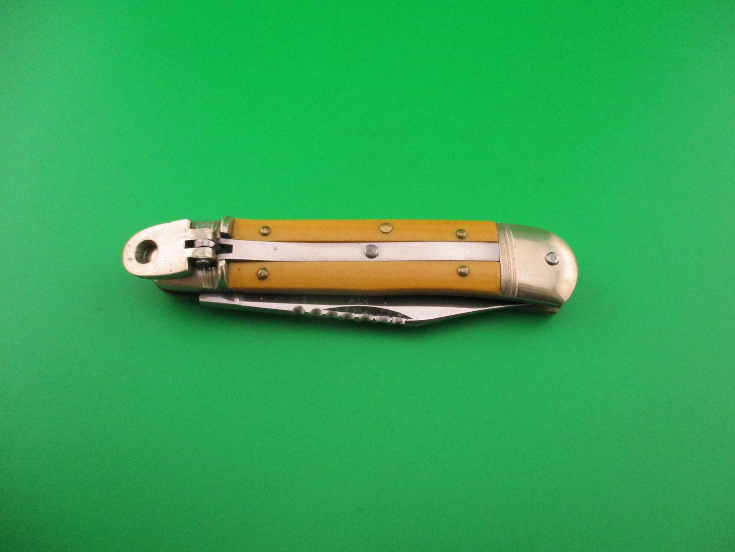 Hubertus 8cm West German Liliput Lever Yellow Micarta File work automatic knife