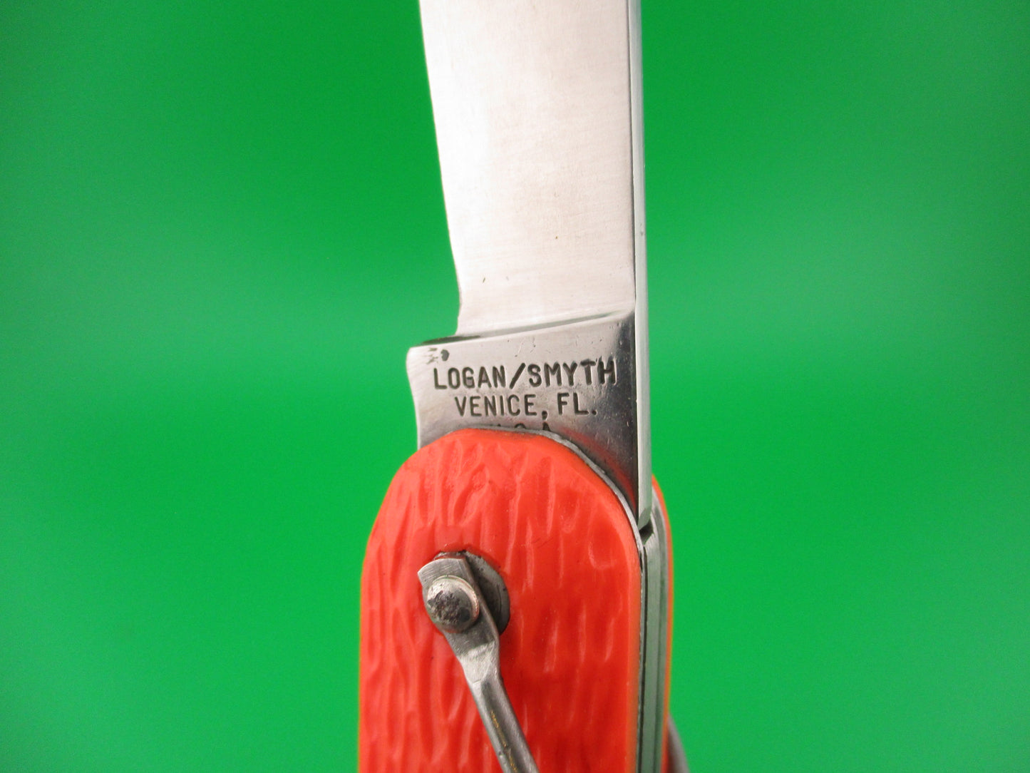 Logan Smyth Venice FL Orange Paratrooper automatic knife