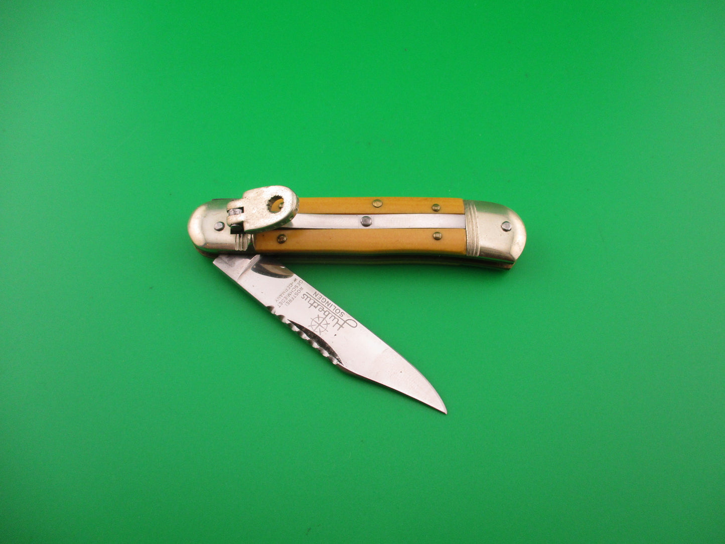 Hubertus 8cm West German Liliput Lever Yellow Micarta File work automatic knife