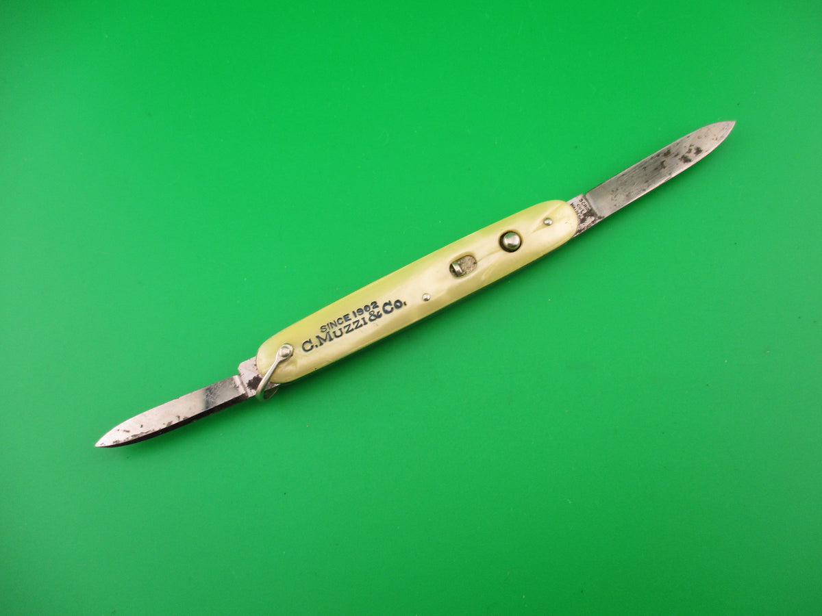Schrade Cut Co small double Marine Pearl C.Muzzi & Co switchblade knife