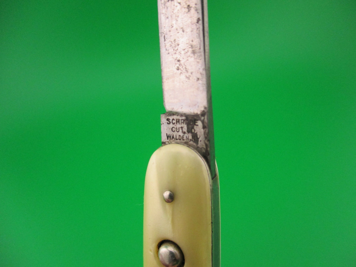 Schrade Cut Co small double Marine Pearl C.Muzzi & Co switchblade knife