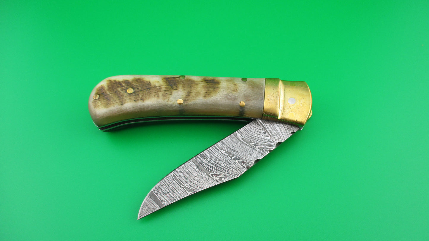 Damascus Rams Horn & Brass Lever knife with Leather case