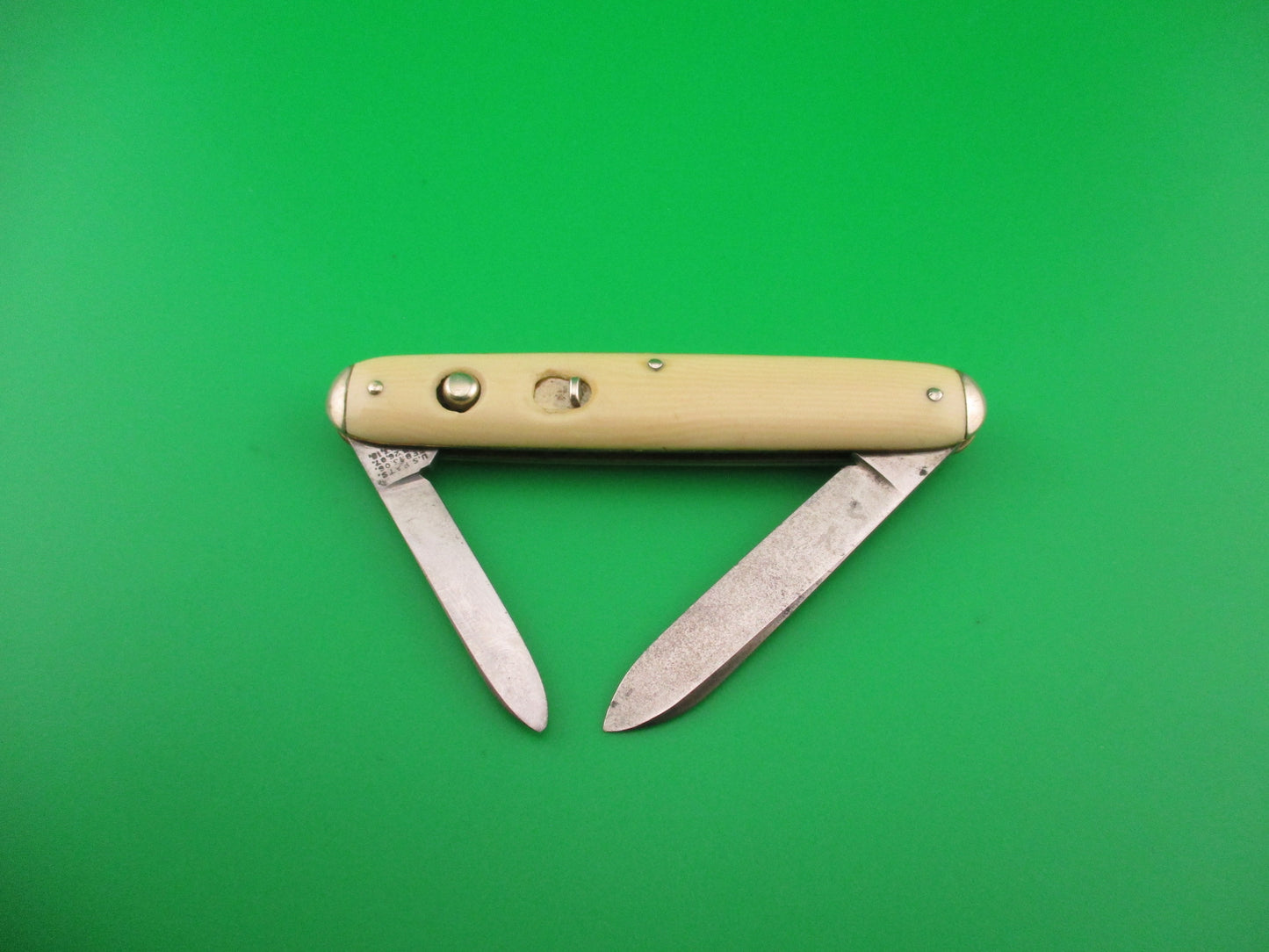SHAPLEIGH HDW CO DE Etched Medium double Ivory cell Tip bolster switchblade knife