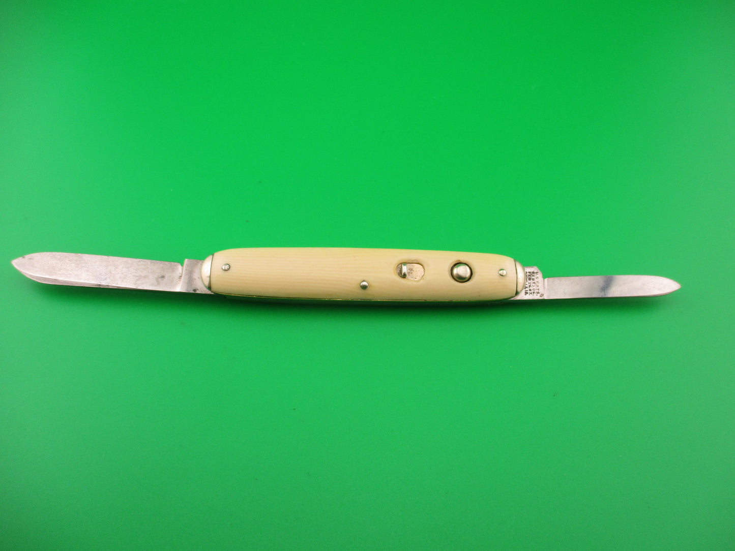 SHAPLEIGH HDW CO DE Etched Medium double Ivory cell Tip bolster switchblade knife