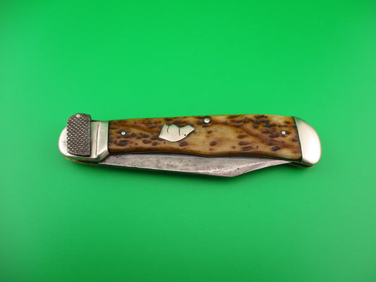 UNION CUT CO OLEAN NY Dog's Head Lever release Vintage automatic knife