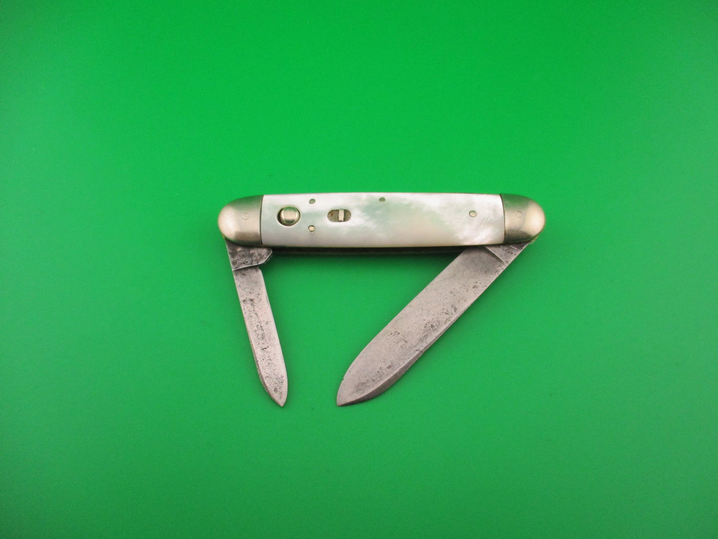 SCHRADE CUT CO  3 3/4" 7506B Large double MOP Full bolstered vintage switchblade