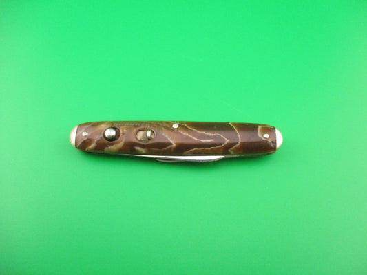 SHAPLEIGH HDW CO Medium double Caramel swirl Tip bolster vintage automatic knife