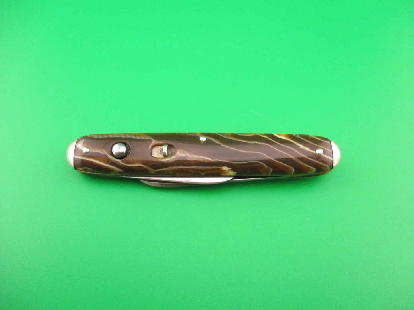 SHAPLEIGH HDW CO Medium double Caramel swirl Tip bolster vintage automatic knife