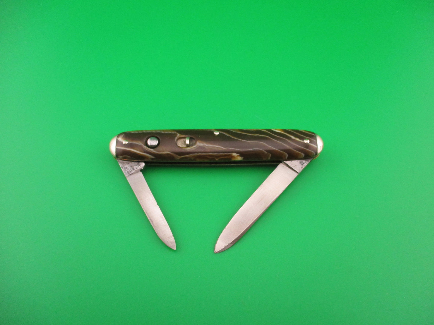 SHAPLEIGH HDW CO Medium double Caramel swirl Tip bolster vintage automatic knife