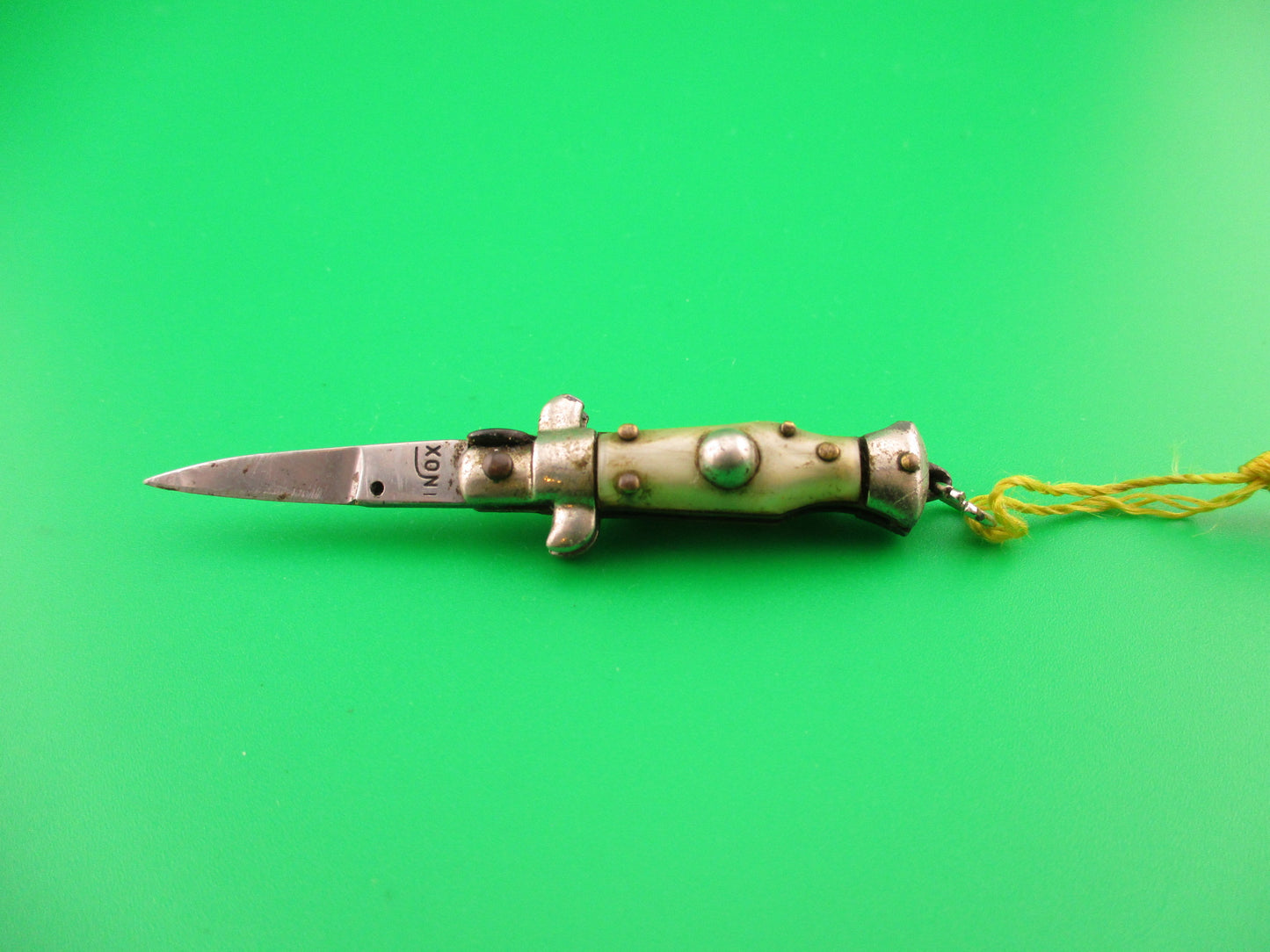 INOX 7cm Italian Tiny Picklock 4 pin Pearlex Yellow tassel vintage 1970s automatic knife