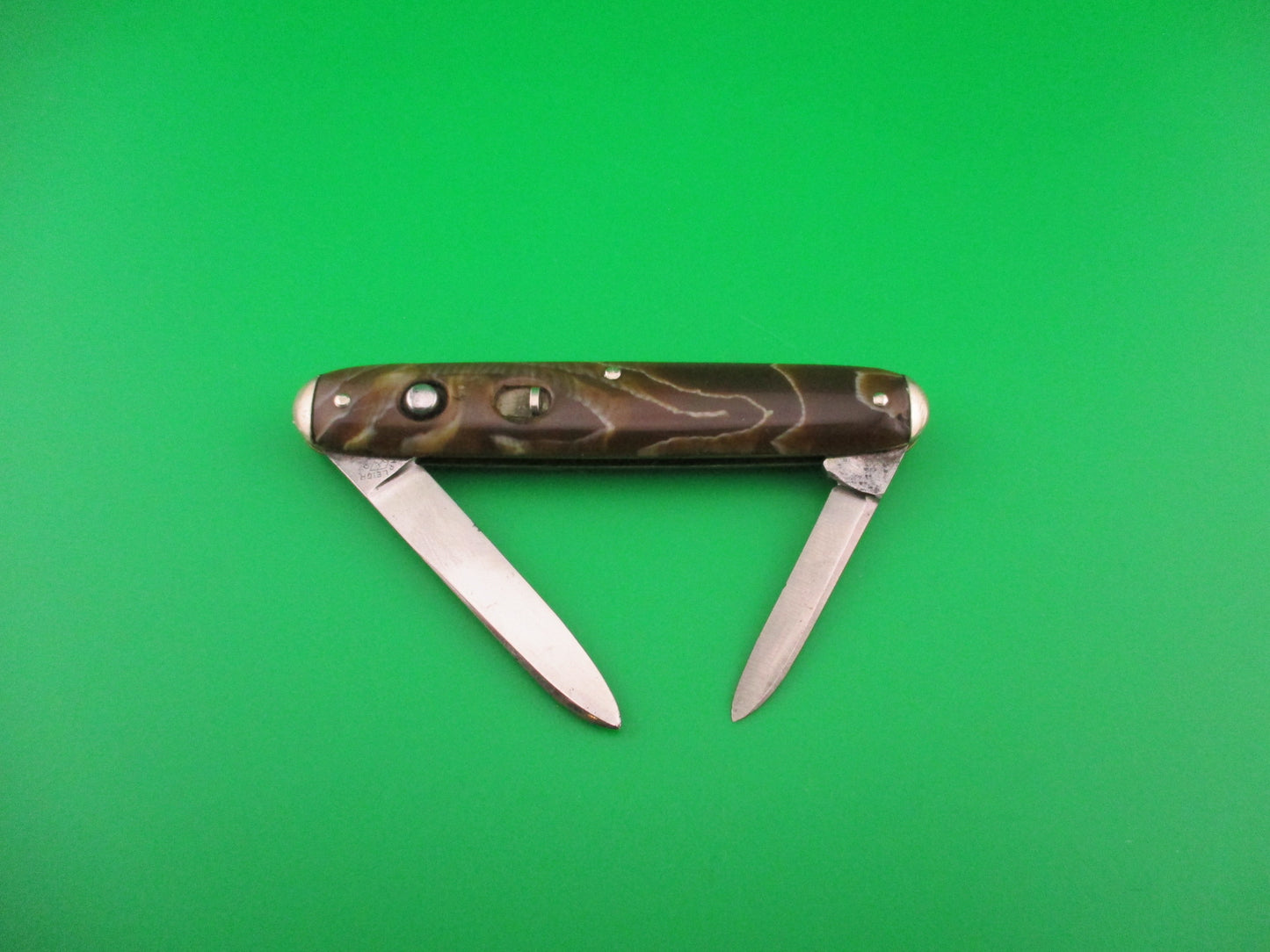 SHAPLEIGH HDW CO Medium double Caramel swirl Tip bolster vintage automatic knife