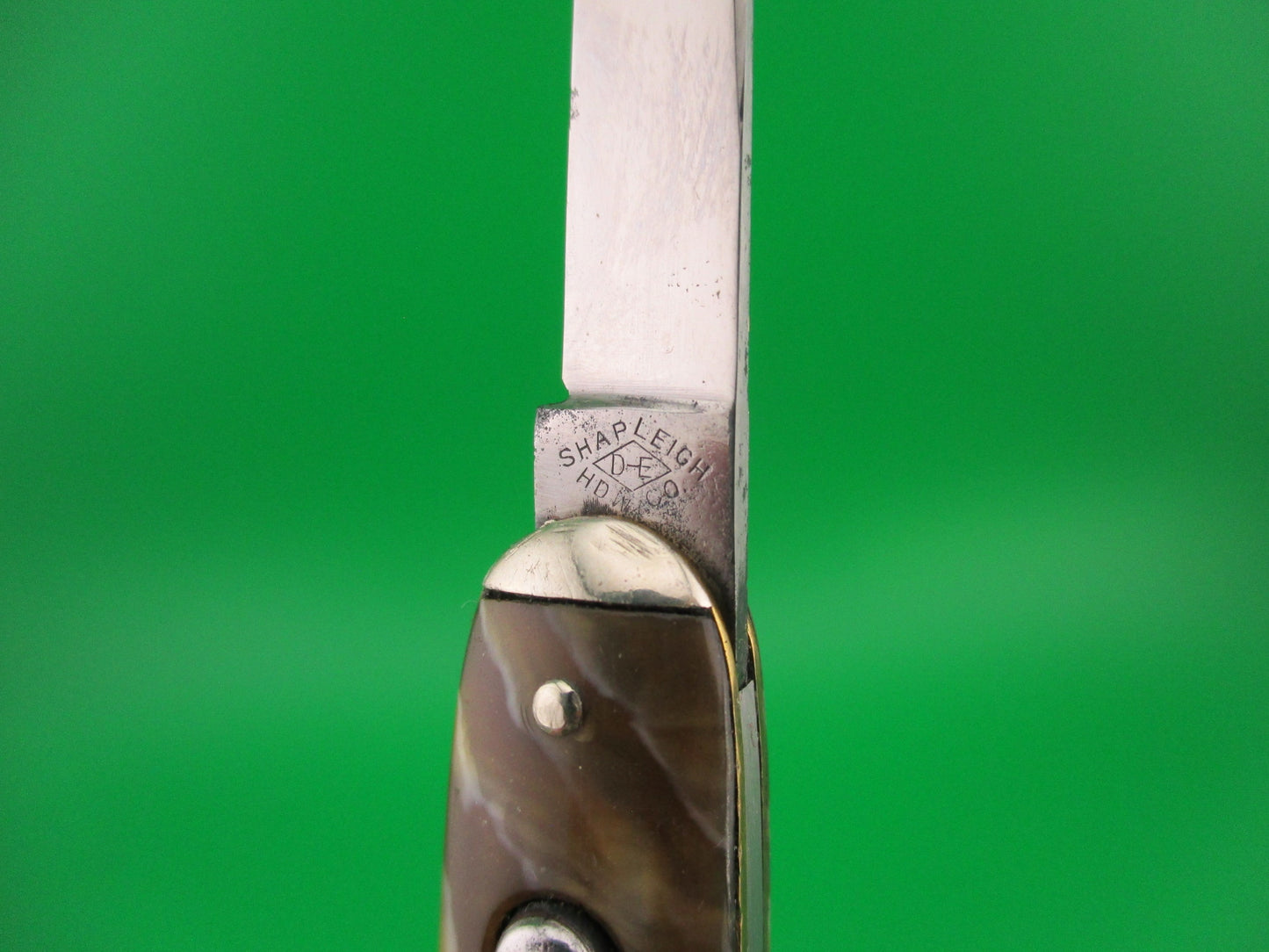 SHAPLEIGH HDW CO Medium double Caramel swirl Tip bolster vintage automatic knife