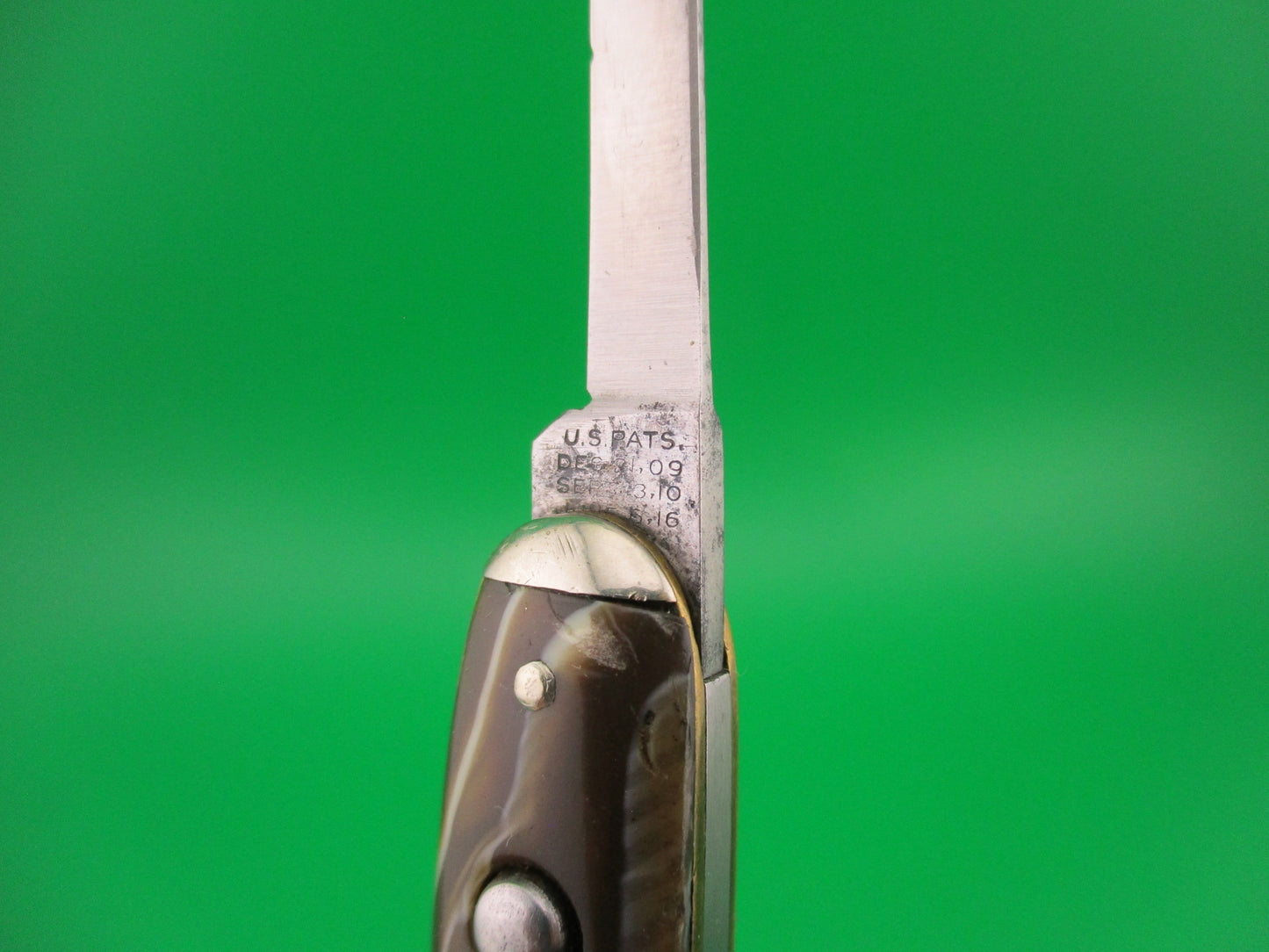 SHAPLEIGH HDW CO Medium double Caramel swirl Tip bolster vintage automatic knife