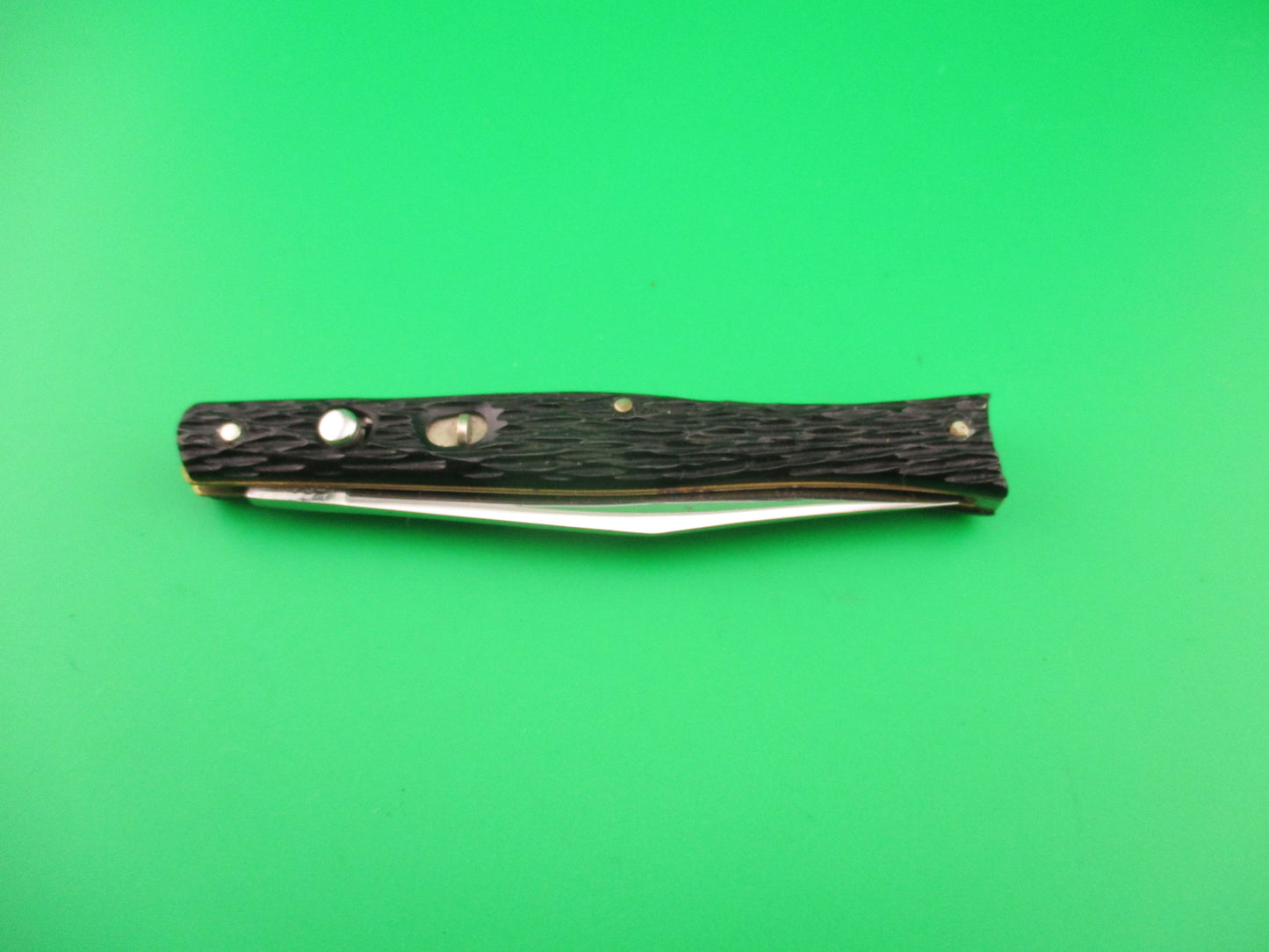 PRESTO 4 inch Fishtail Black jigged Near Mint vintage automatic knife