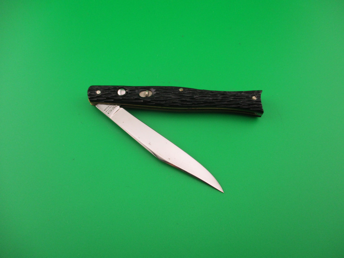 PRESTO 4 inch Fishtail Black jigged Near Mint vintage automatic knife