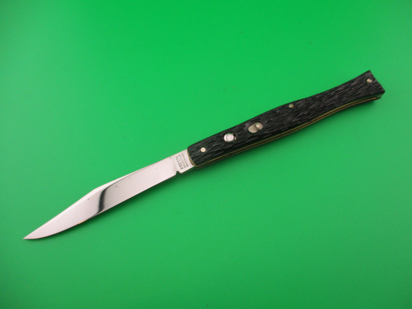 PRESTO 4 inch Fishtail Black jigged Near Mint vintage automatic knife
