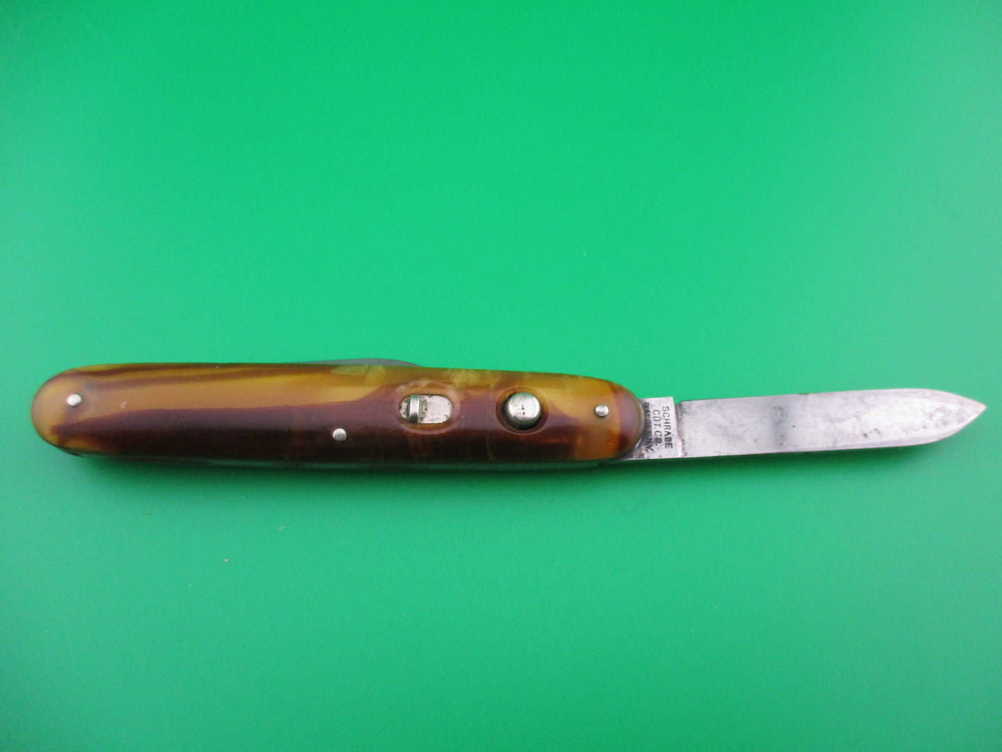 Schrade Cut Co medium double Butter & Molasses switchblade