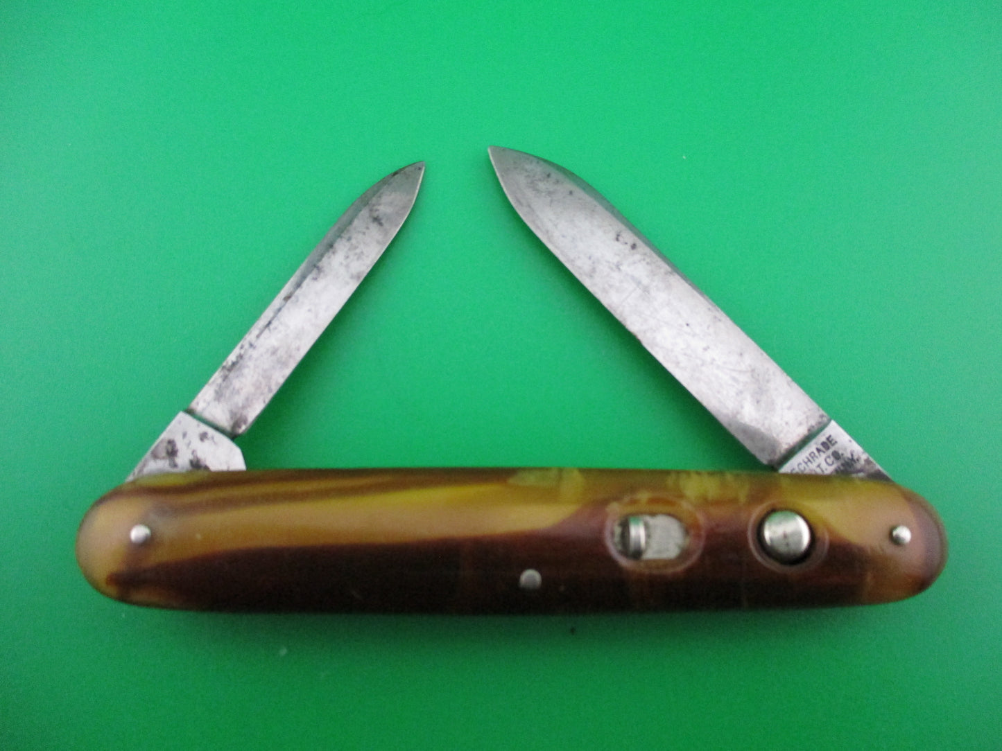 Schrade Cut Co medium double Butter & Molasses switchblade