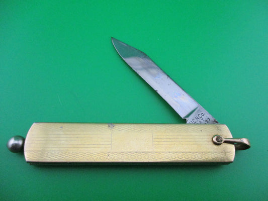 JCN Co Gold pullball switchblade