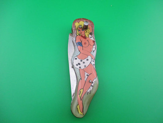 Russian Prison Knife Sexy woman switchblade knife topless spots