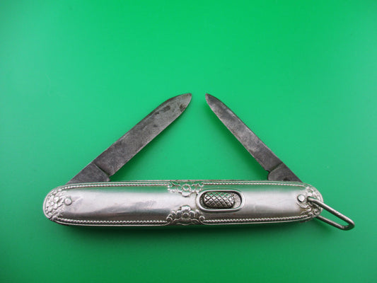 Flylock Double Silver colored Ornate metal handled switchblade knife