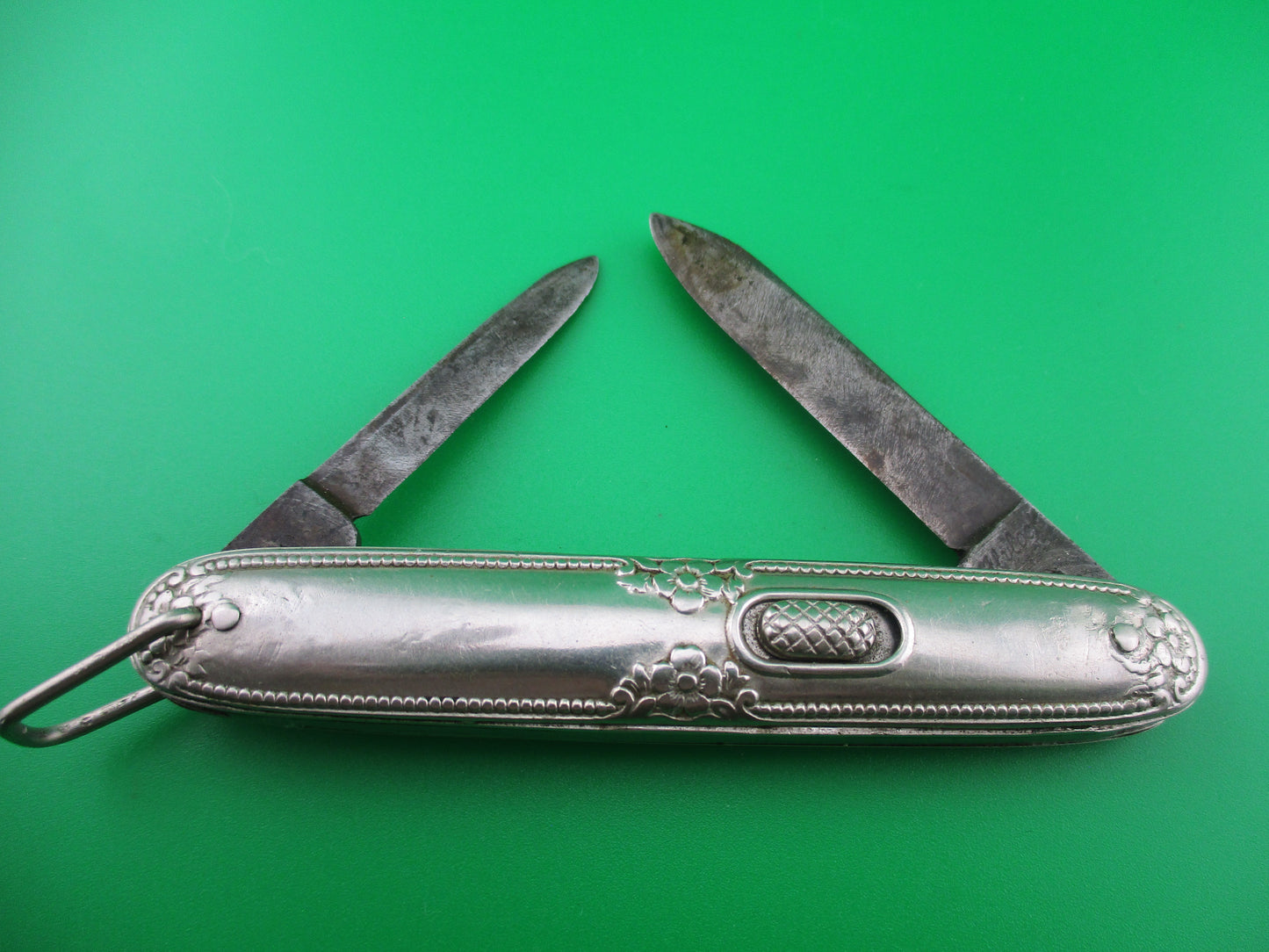 Flylock Double Silver colored Ornate metal handled switchblade knife