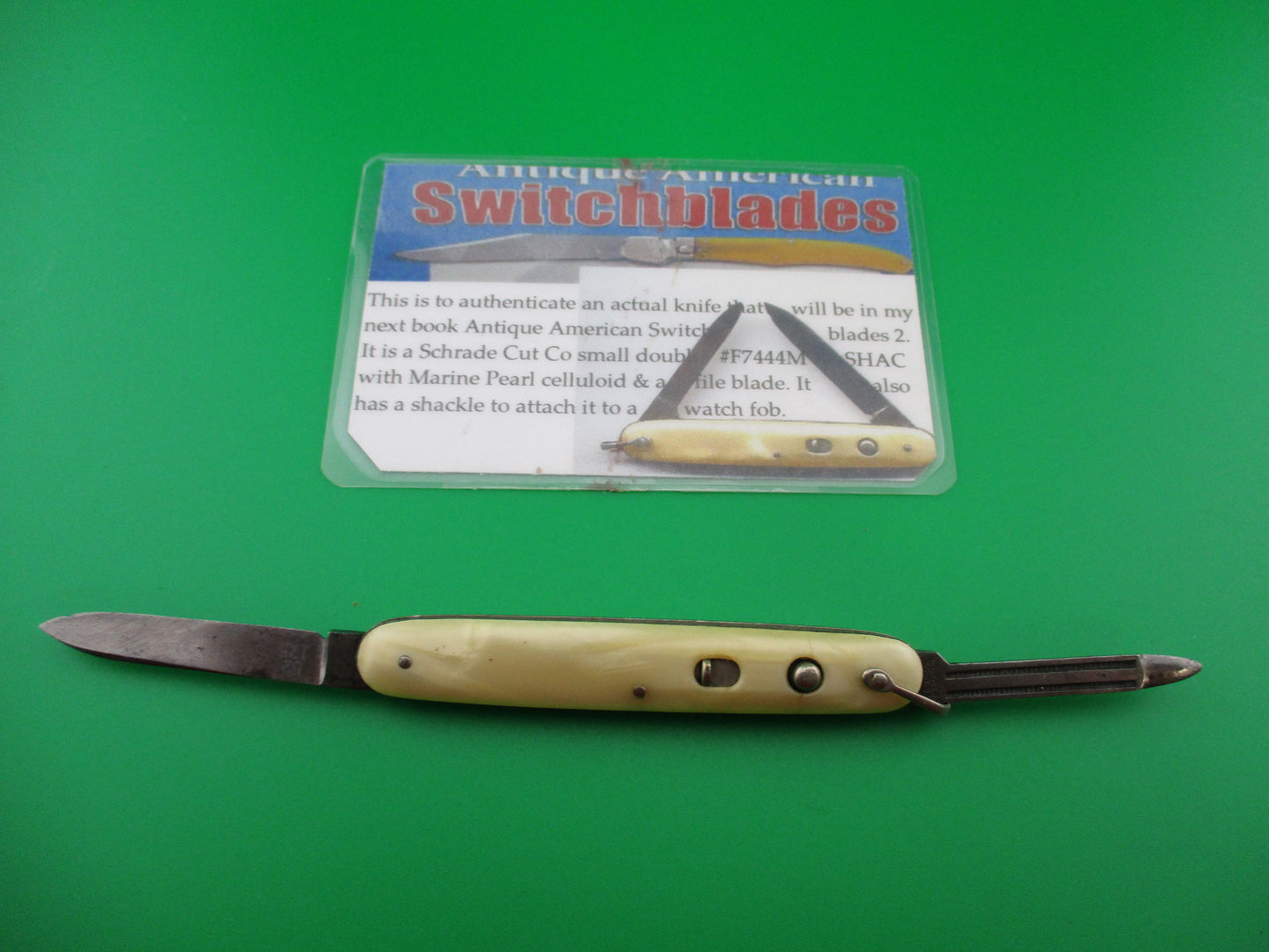 Schrade Cut Co Marine Pearl small double w shackle & file blade