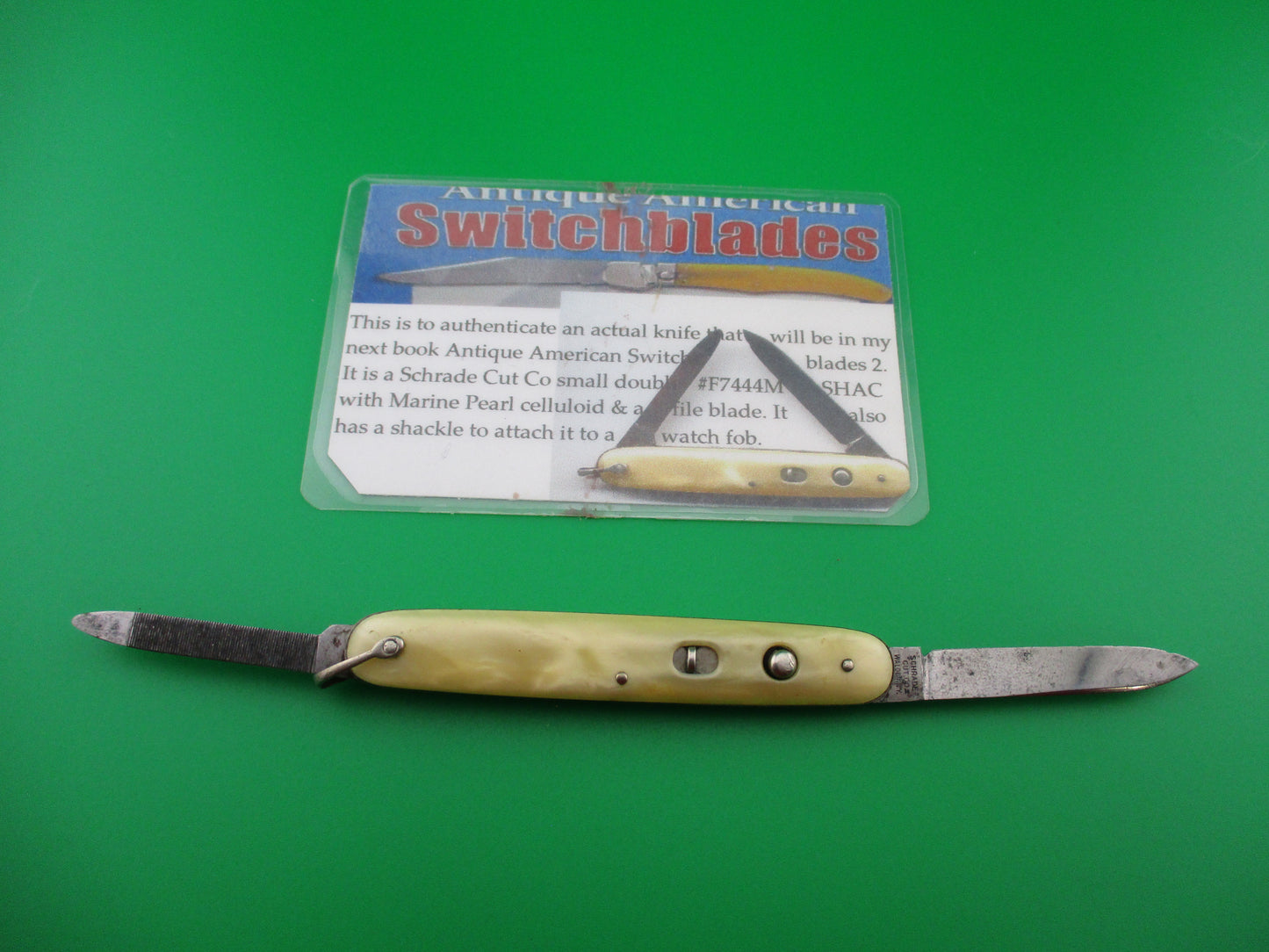 Schrade Cut Co Marine Pearl small double w shackle & file blade