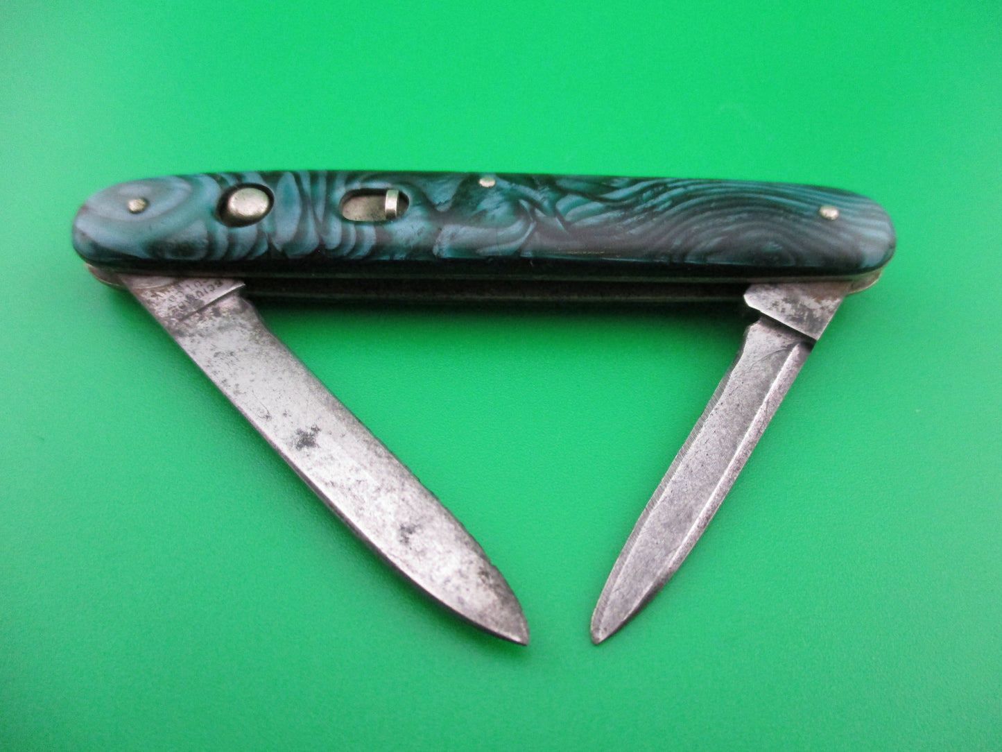 Schrade Cut Co small double Green Pearl Waterfall cell switchblade knife