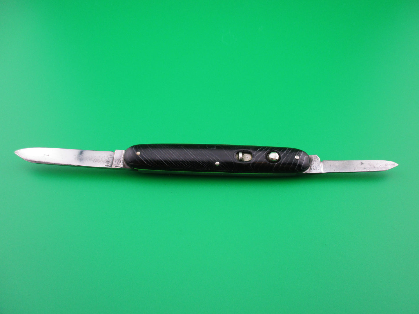 Schrade Cut Co medium double Black waterfall celluloid switchblade knife
