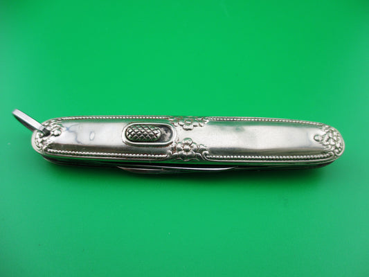Flylock Double Silver colored Ornate metal handled switchblade knife