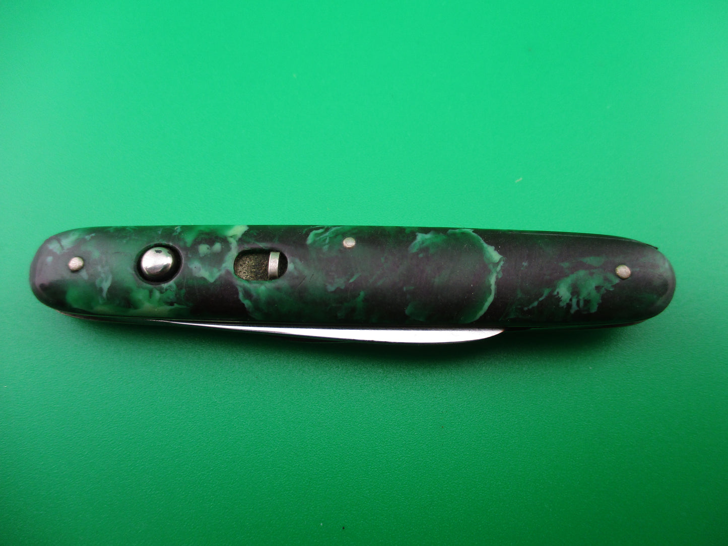 Schrade Walden small double 7444X Green black mottled celluloid switchblade knife