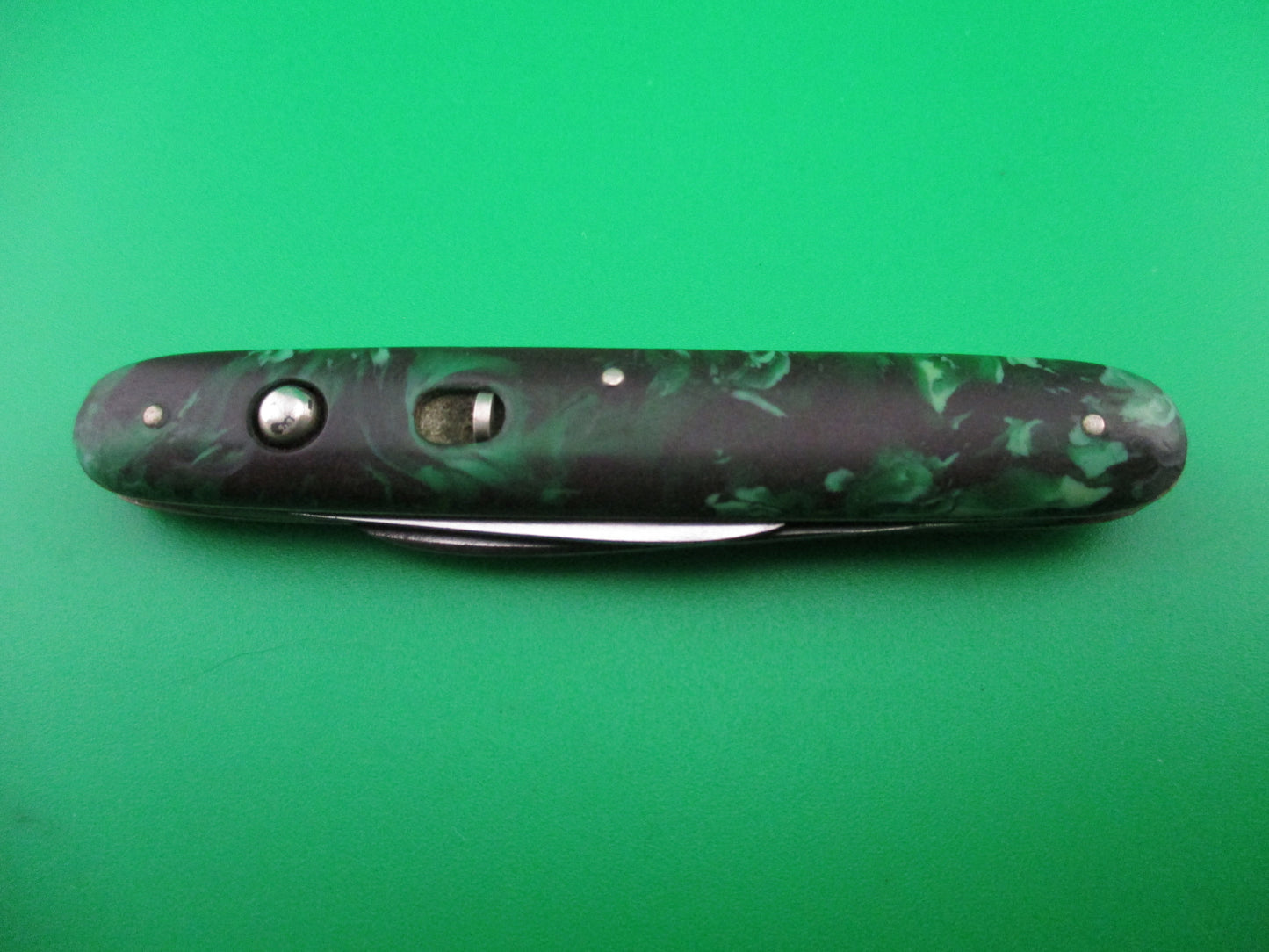 Schrade Walden small double 7444X Green black mottled celluloid switchblade knife