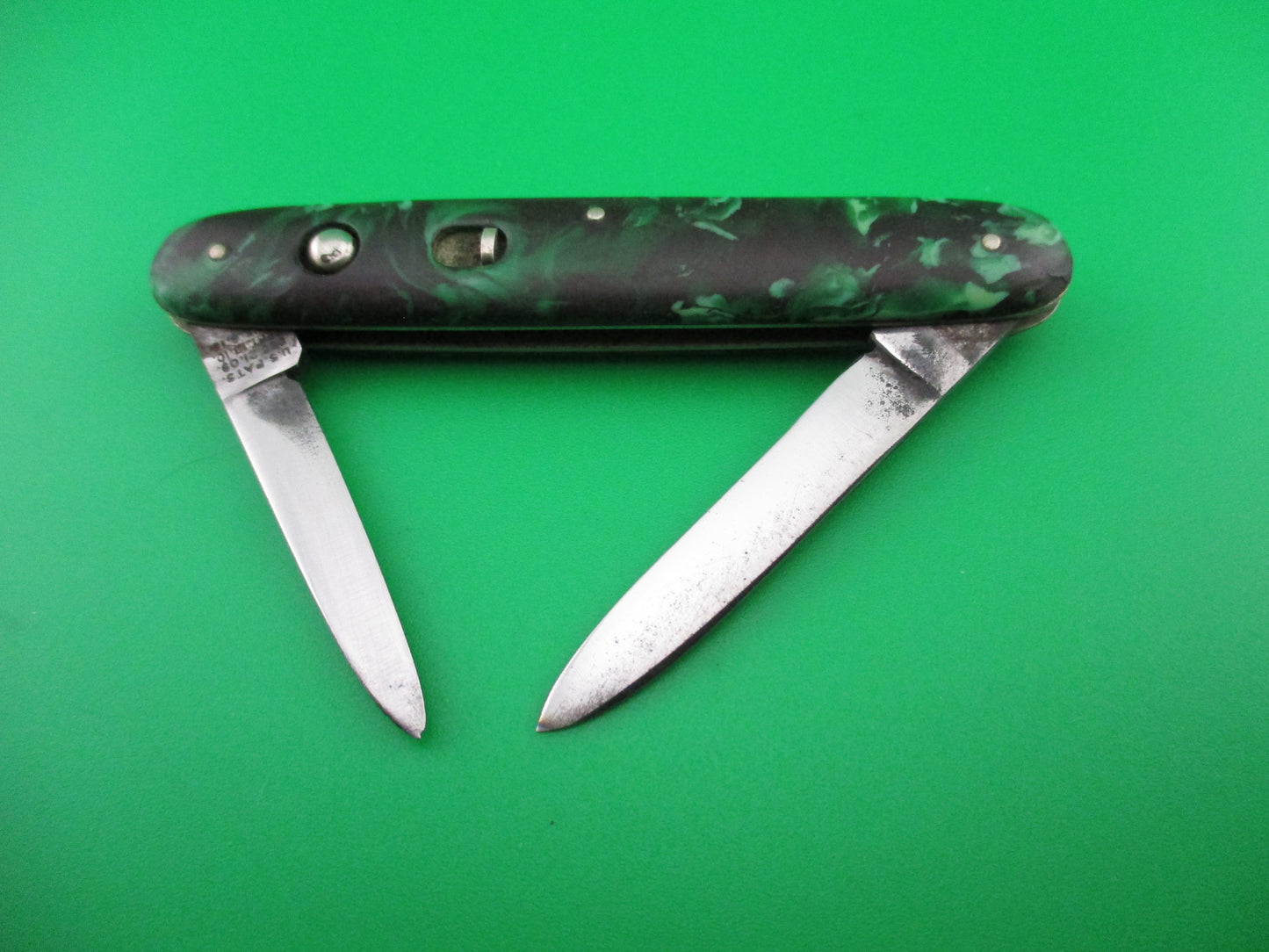 Schrade Walden small double 7444X Green black mottled celluloid switchblade knife