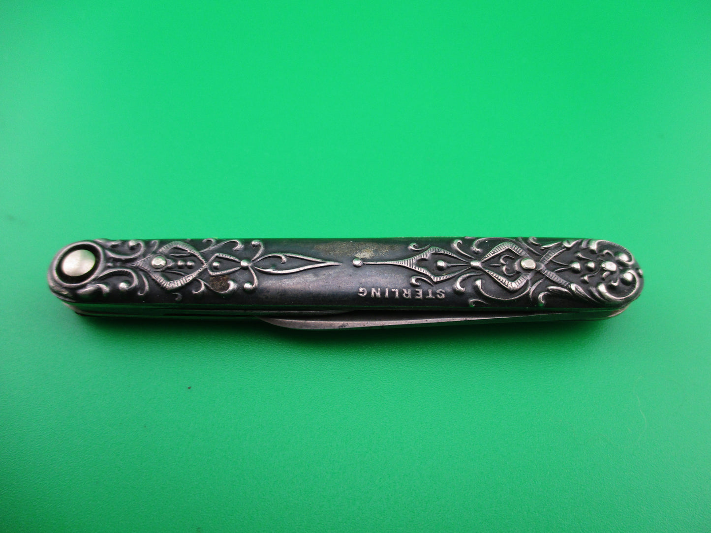 PRESS BUTTON KNIFE CO small double Sterling Gothic antique switchblade knife