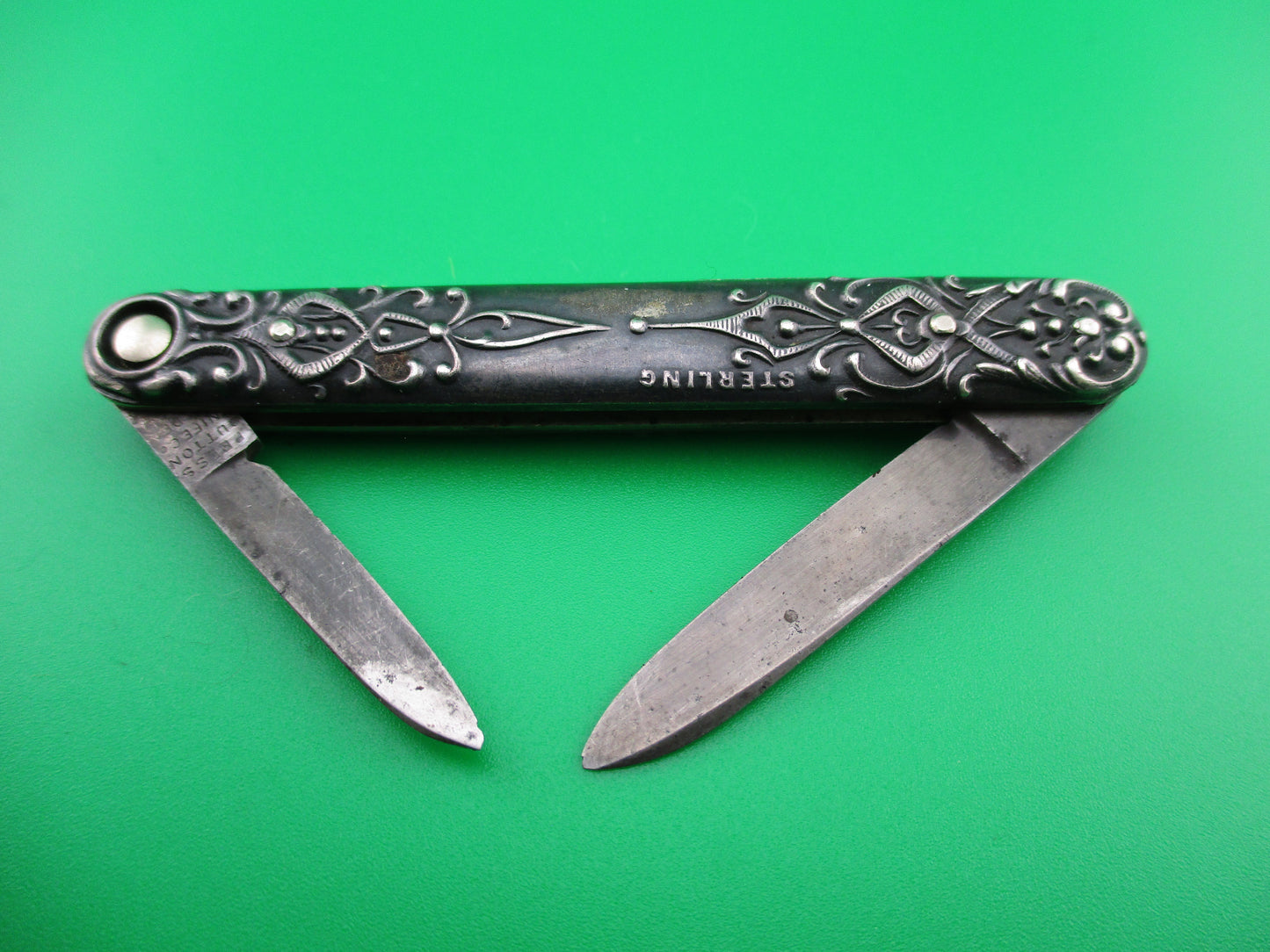 PRESS BUTTON KNIFE CO small double Sterling Gothic antique switchblade knife