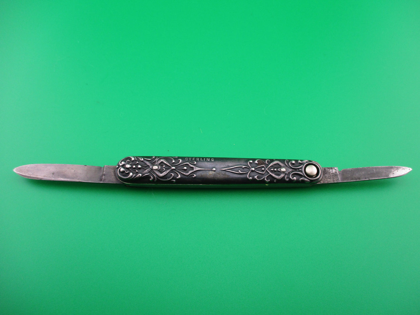 PRESS BUTTON KNIFE CO small double Sterling Gothic antique switchblade knife